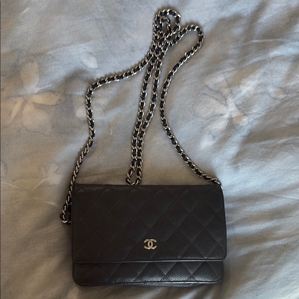 CHANEL wallet on the chain. Matte Black caviar Quilted Crossbody Bag.